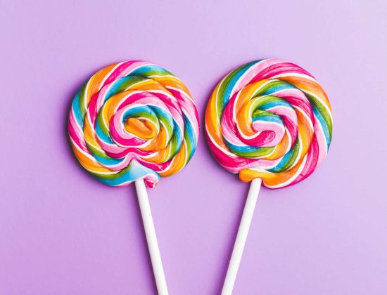 two-sweet-colorful-lollipop-RQZFJDB-scaled.jpg